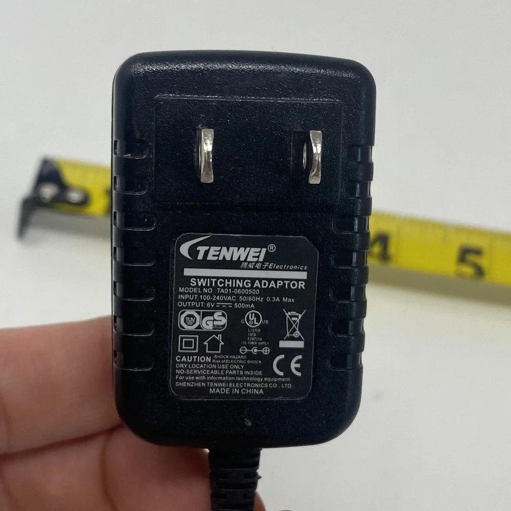 Tenwei Electronics Switching Adapter Model TA01-0600500 Input 100-240VAC 50/60Hz